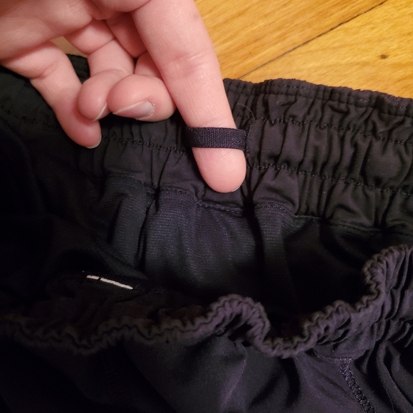 Lululemon Super Squad shorts. Black and gold. Size 6. Built in liner. - Picture 8 of 12